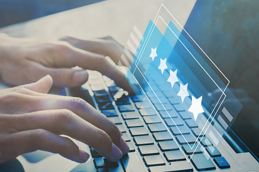 positive feedback, writing online review with 5 five star rating, reputation management concept